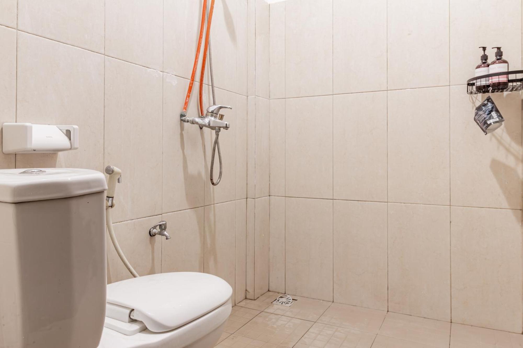 Capital O 93944 Geweka Homestay ジンバラン エクステリア 写真